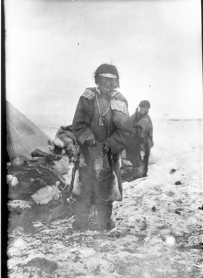 Woman with qaurut (headband)